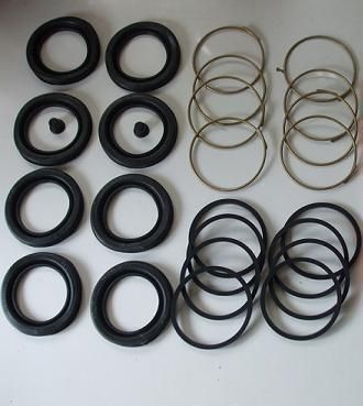 FRONT BRAKE CALIPER REPAIR SEALS KITS x2 (Jaguar XJ6 & XJ12) (Oct 73- 1994)